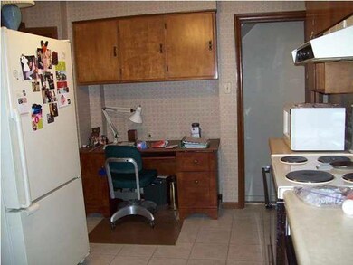 Kitchen with desk area that could be adjusted for 