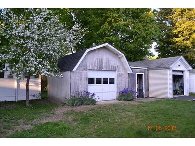 Exterior Back. Fenced in yard with a...