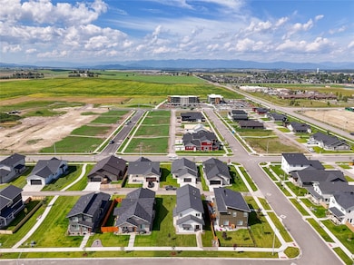 Aerial perspective of suburban area with mountains