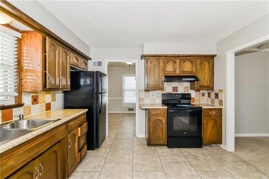 506 N Jefferson St, Raymore, MO 64083 - photo 7