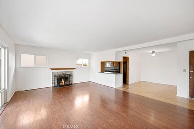 Living Room (looking SW) with view of Dining Room and Kitchen