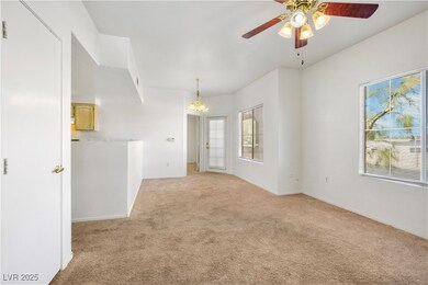 Spare room featuring ceiling fan and light colored