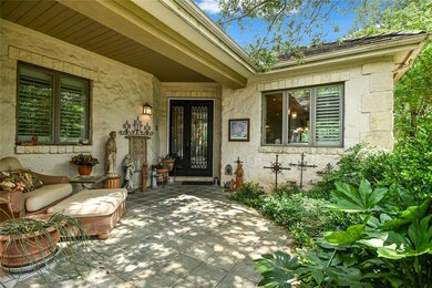 Entrance to property featuring french doors, a pa