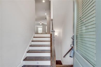 House Entrance Stairs Featuring Hardwood Stairs