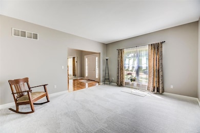 Formal living room-flows into family room. Allows 