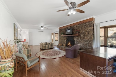 Cozy spacious living room with wood fireplace
