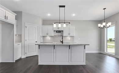 Photos provided depict previous model, design features may vary