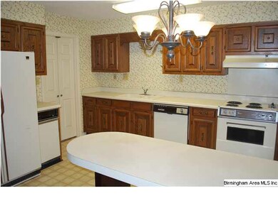KITCHEN WITH BREAKFAST BAR, PANTRY, LOTS OF CABINE