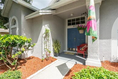 Freshly painted front door & welcoming front porch