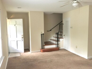 Living Room w/stairs to 2nd Fl.