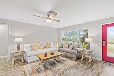 Living room featuring wood-type flooring, ceiling 