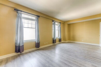 Spare room featuring light hardwood / wood-style f