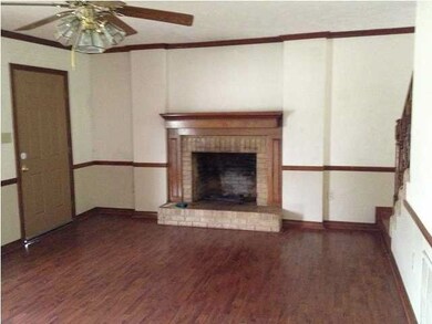 Living room with cozy fireplace.
