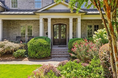 Welcoming front entry with double doors