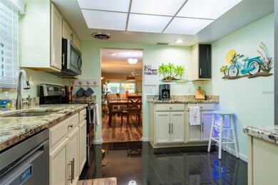 Kitchen looking into the dining room and living room