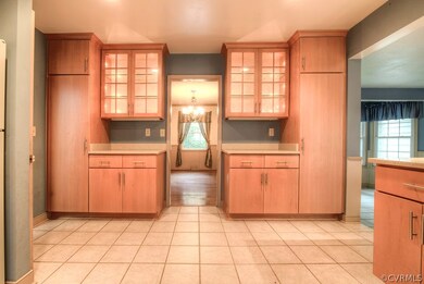 Glass front with interior lighting, and double pantry cabinety...how much more storage could you imagine?