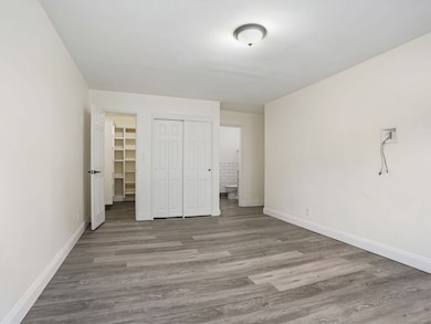 Master bedroom with full bath and walk-in closet.