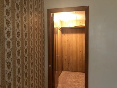 Walk in closet in master bedroom