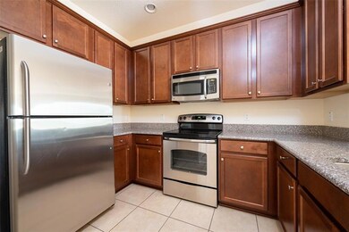 Kitchen view #1 with stainless steel appliances and granite countertops