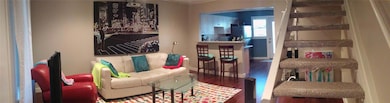 Sitting room featuring wood finished floors