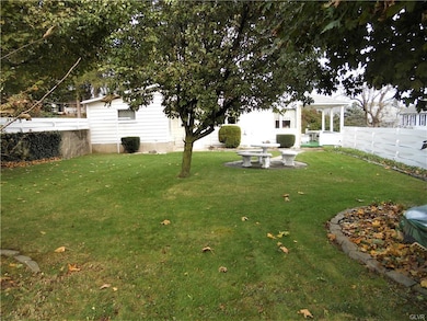 Beautiful private back yard  is enclosed on 3 side