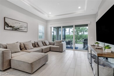 Living room with a wealth of natural light, a tray