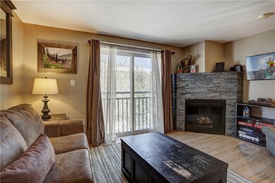 Living Room features wood fireplace and plenty of