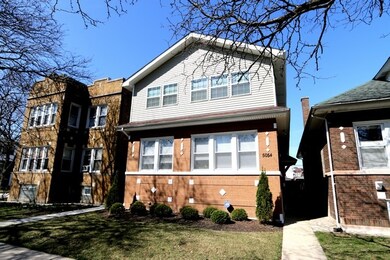 5054 W Oakdale Ave, Chicago, IL 60641 - photo 2