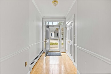 Front hall with coat closet