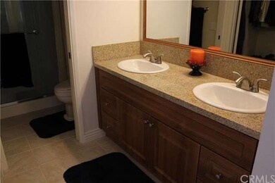 Remodeled master bathroom with new vanity with dual sinks.