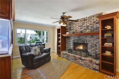 Cozy reading room with custom brick fireplace and 