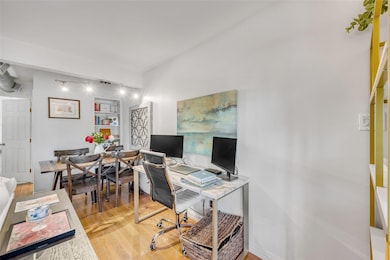 Office with light wood finished floors
