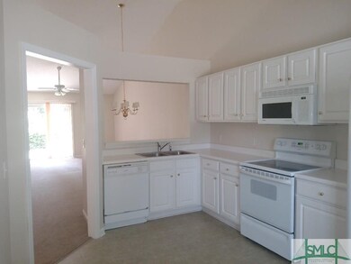 Sunny kitchen open plan for entertaining.