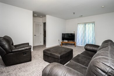 Living room featuring carpet flooring