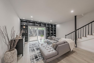 Living room featuring recessed lighting, light woo