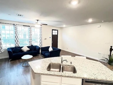 Kitchen with visible vents, dishwasher, a ceiling 