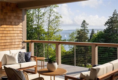Spacious covered deck with room for dining and lou