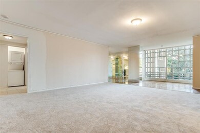 Living room with view of Sunroom and Dining room