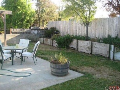 Private fenced yard nicely lanscaped.