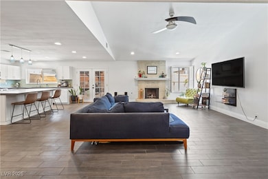 Living room featuring a wealth of natural light, a