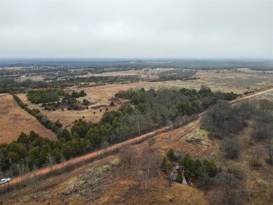 Birds eye view of property with a rural view