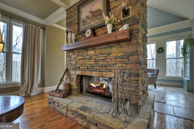 Main level family room with 2-sided fireplace