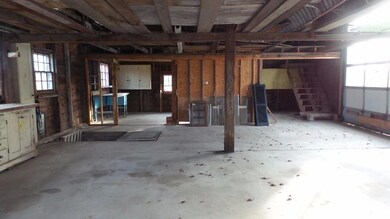 Interior of the barn showing the...