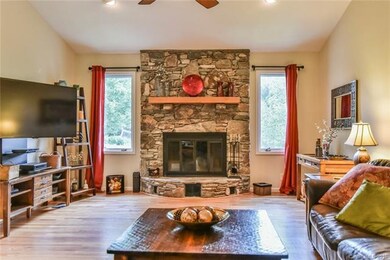 Cathedral Ceilings and Windows Provides Lots of Na