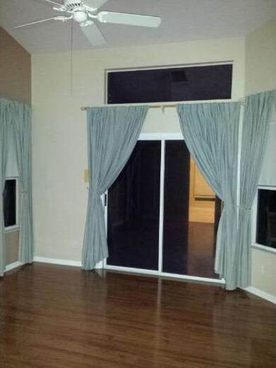 6 - Master Bedroom with Vaulted Ceiling
