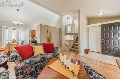 Living room featuring high-end laminate flooring, 