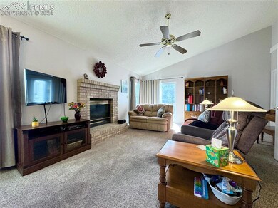 Vaulted Living Room with Gas Fireplace, Ceiling Fa
