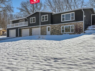 Home has a new driveway, new brick paver patio, new central AC unit, new water softener, new gutters, and more!