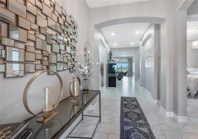 Corridor with marble finish floor, arched walkways