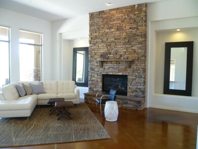 Stacked stone fireplace in liv. rm.
